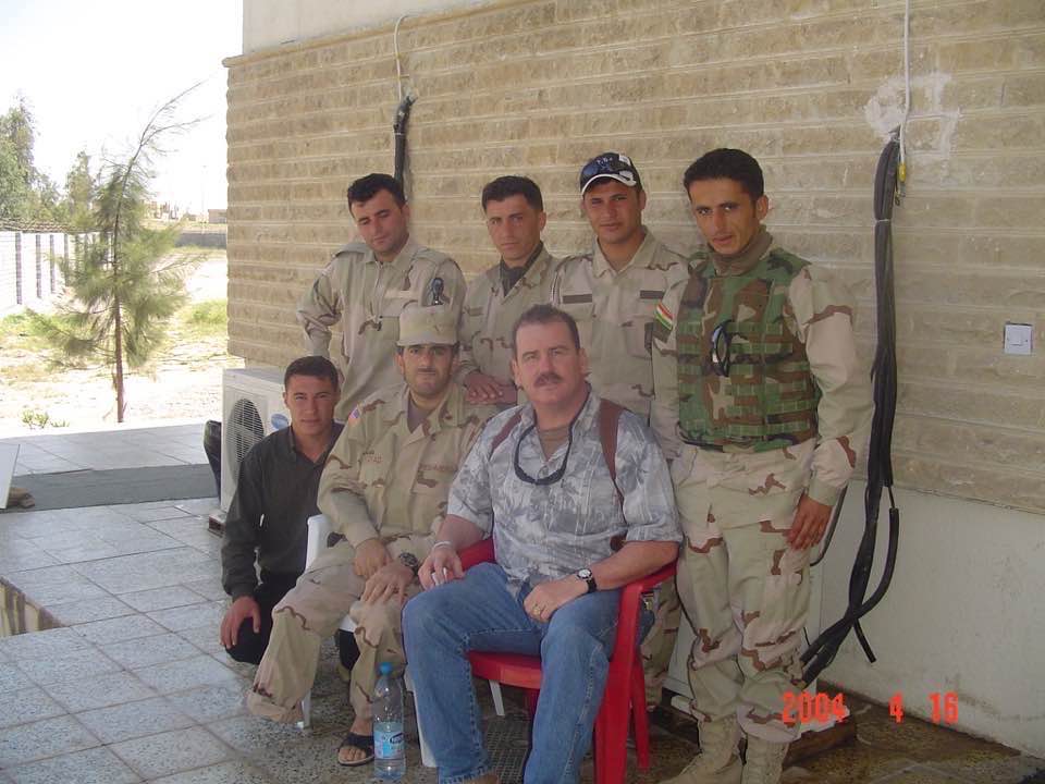 Pat with troops overseas.jpg